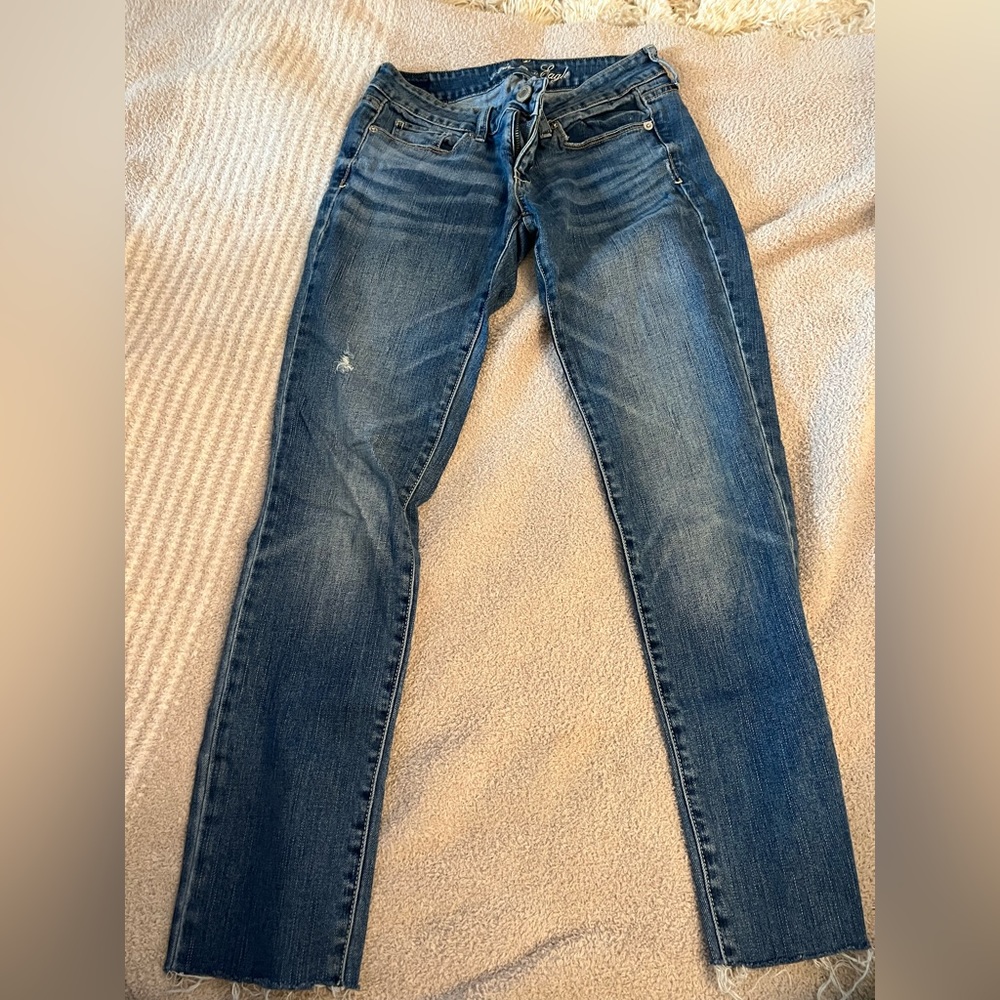 American eagle fringe bottom skinny jeans